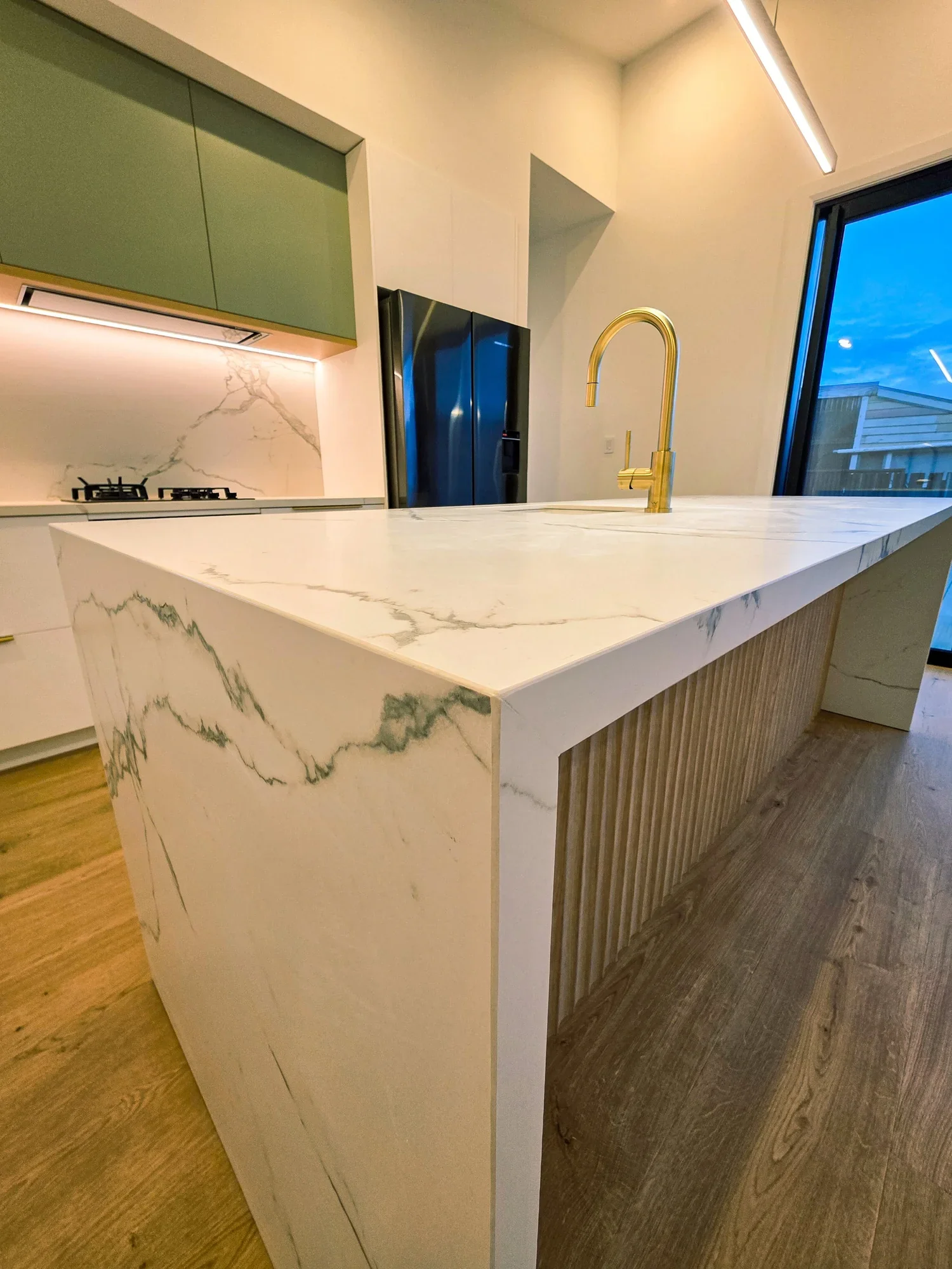 Stone and timber materials in a completed kitchen