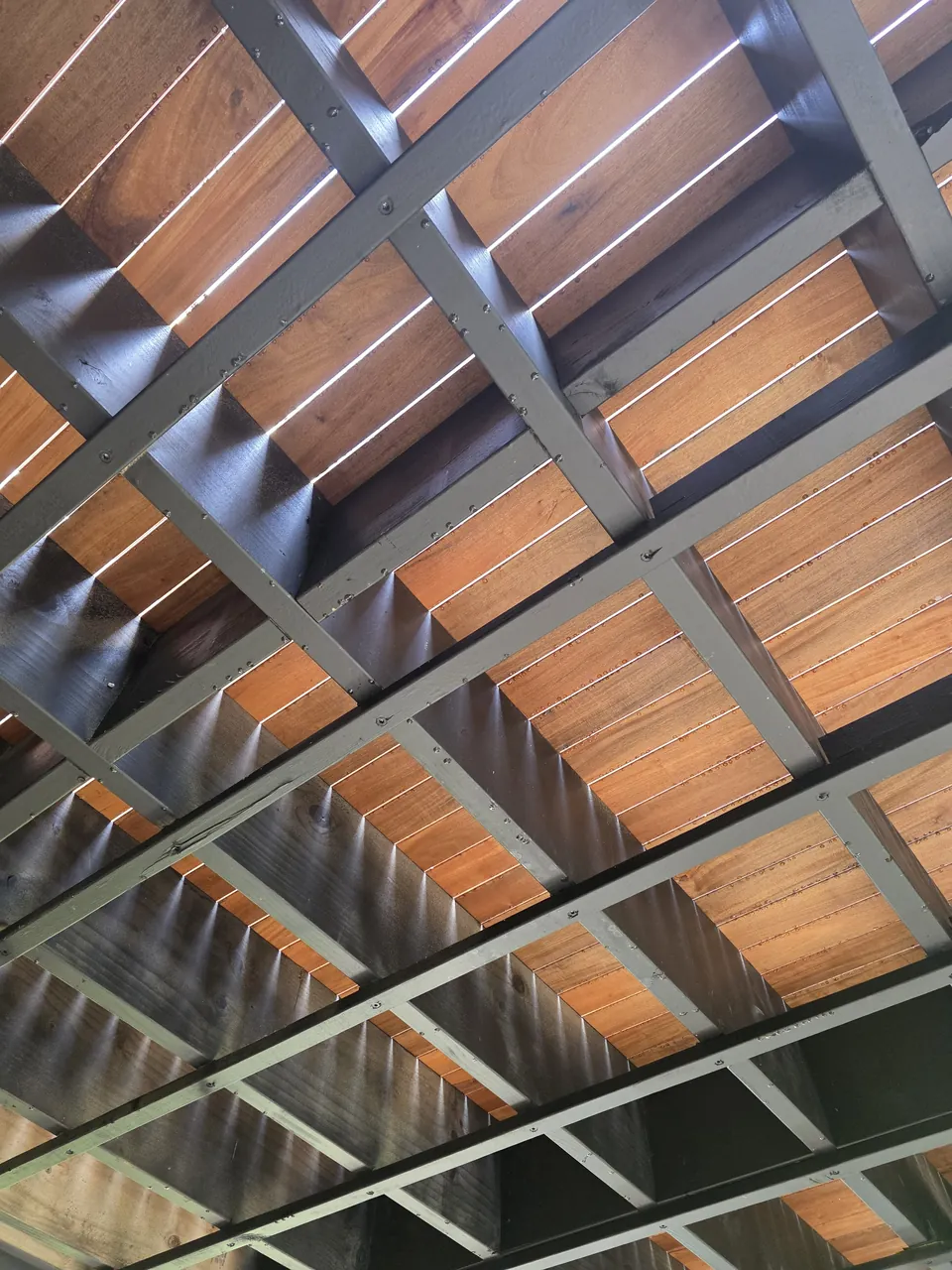 Steel support frame underneath the timber deck