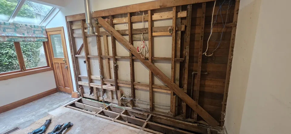 Exposed wall framing during structural repairs